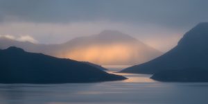 Lake in middle of mountain mist