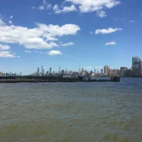 Nyc skyline over the hudson by joshua peisach
