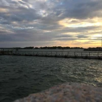 Sunset on the boardwalk by joshua peisach