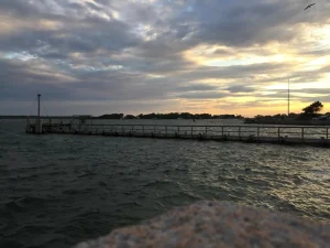 Sunset on the boardwalk by joshua peisach