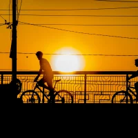 Cycles at sunset by radu galan