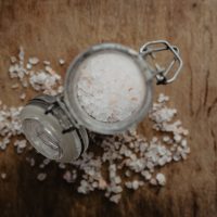 Salt in a glass container by karolina grabowska