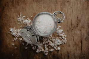 Salt in a glass container by karolina grabowska - Ubuntu Budgie 26.04 Wallpapers - Official Indigo Collection