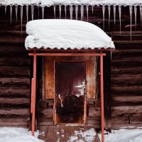 Snow cabin entrance by anton strogonoff