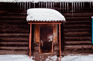 Snow cabin entrance by anton strogonoff - Ubuntu Budgie 26.04 Wallpapers - Official Indigo Collection