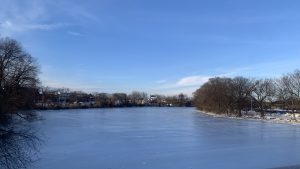 Frozen river by joshua peisach - Ubuntu Cinnamon 26.04 Wallpapers - Official Resolute Raccoon Collection