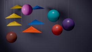 Edubuntu 26.04 omar lopez rincon colorful geometric shapes and spheres arranged on a dark surface - Edubuntu 26.04 Wallpapers - Official Education-Themed Collection
