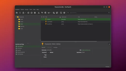 KeePassXC 2.8.0 password manager main window in dark theme on a Ubuntu orange and aubergine gradient background